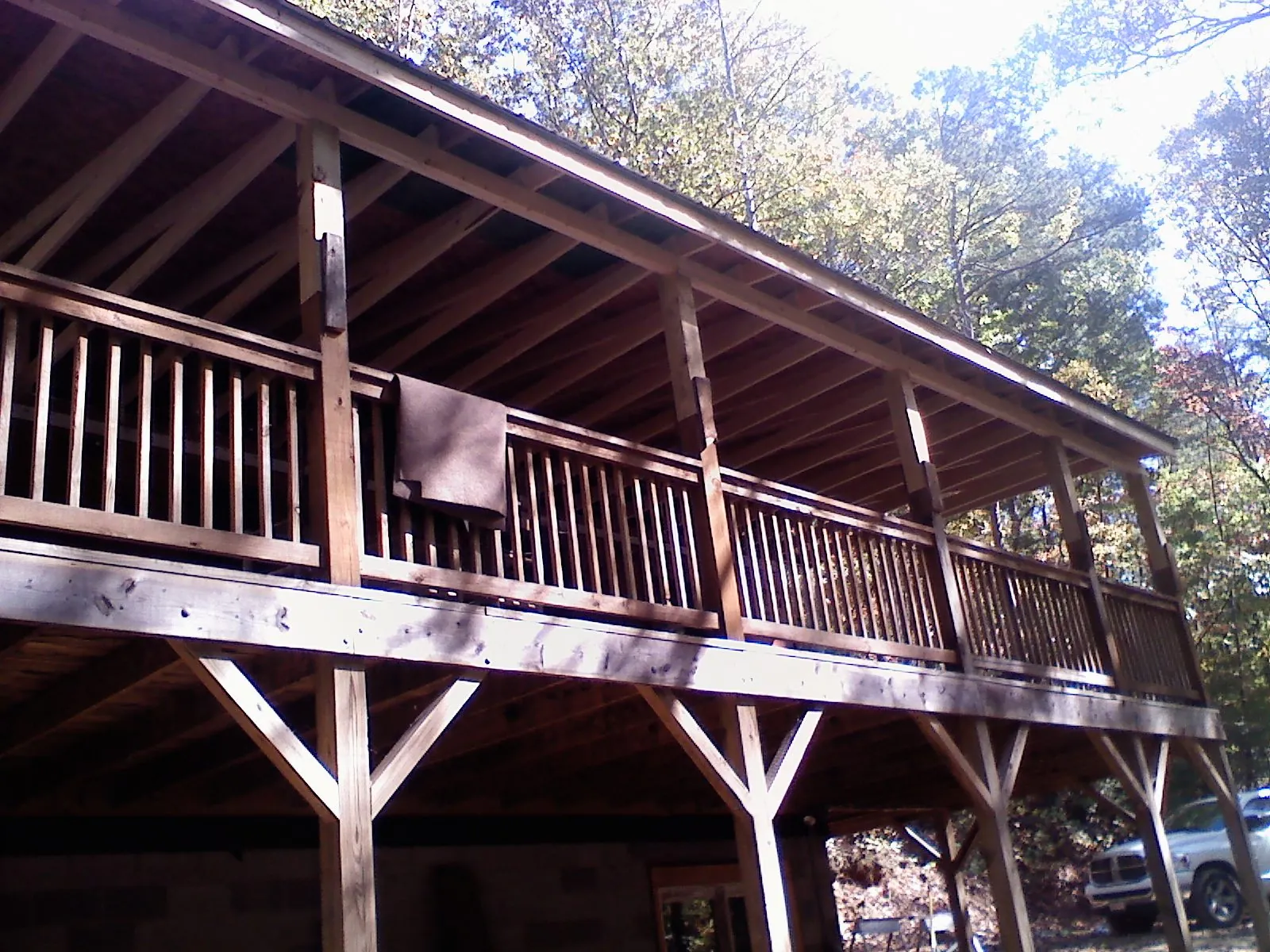 Timber framing under a new elevated porch and deck — Roof Leak Repair in Fischer by Roofing Brothers